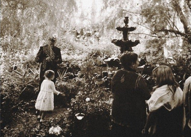 Historical photo of people in a garden